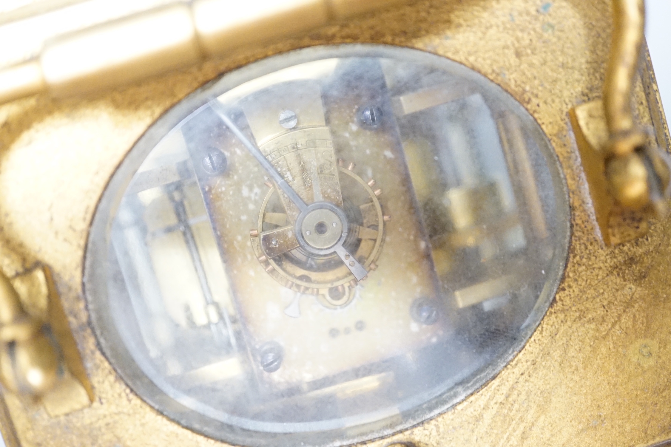 A French brass carriage clock with alarm and push repeat, retailers mark Luis E. Sinn Co. - 15cm